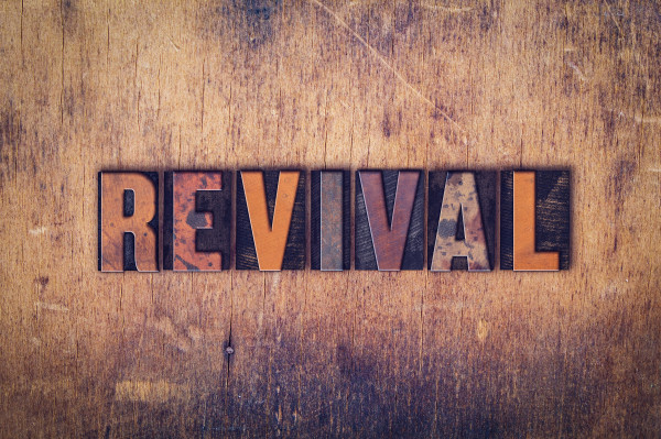 The word Revival in a wood cut out