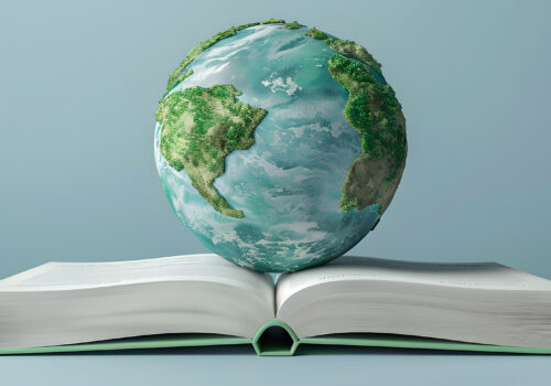 Globe on top of an open book